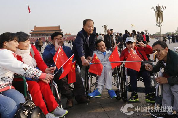 图片14感党恩 报党情 身残志坚的王延滨公益在路上.jpg